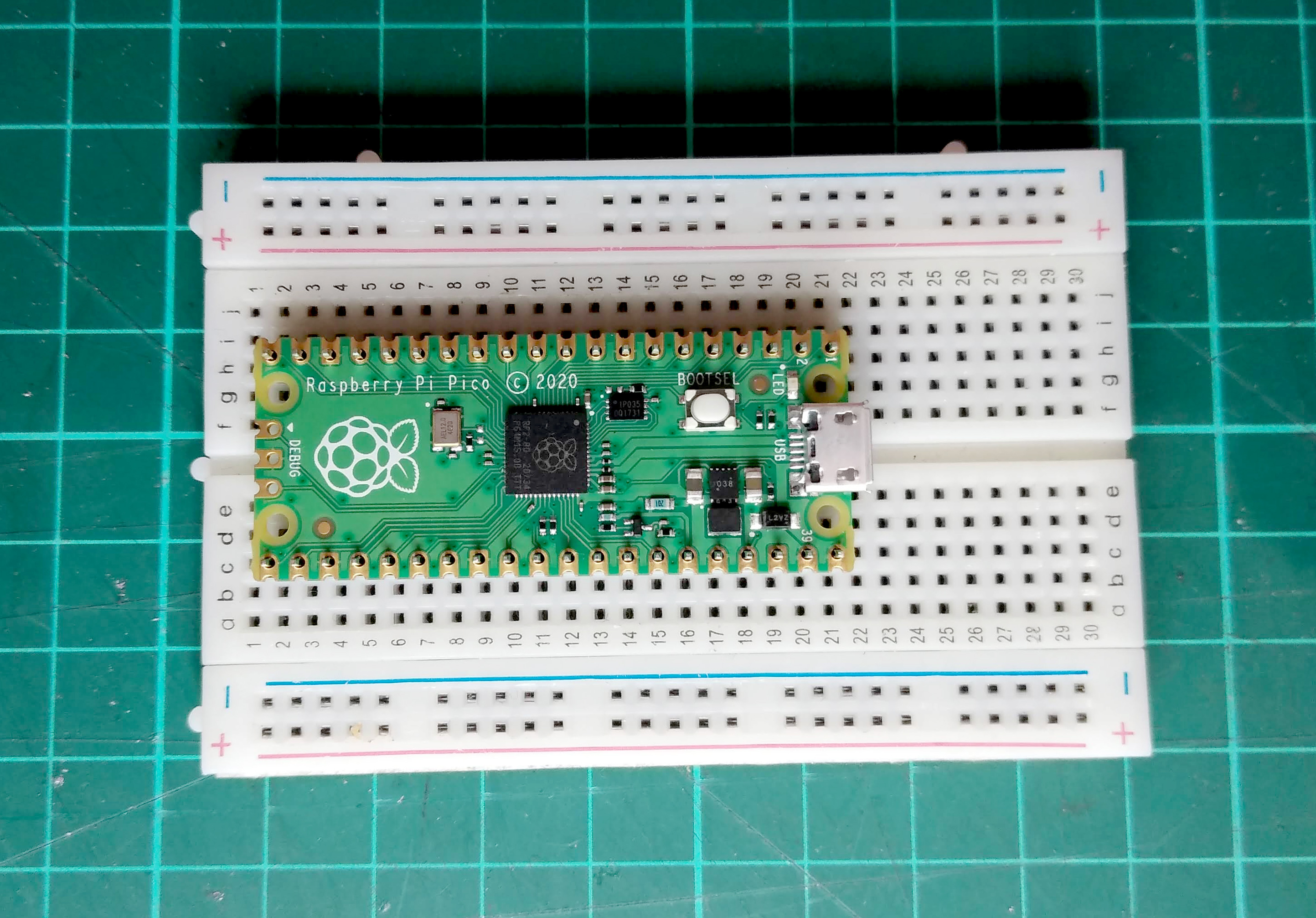 mount-board-and-pins-on-breadboard